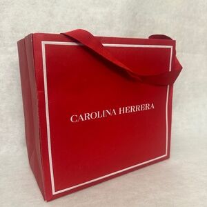 Carolina Herrera Shopping Bag 9 x 9.5 x 4.5" Heavy glossy paper Ribbon handles